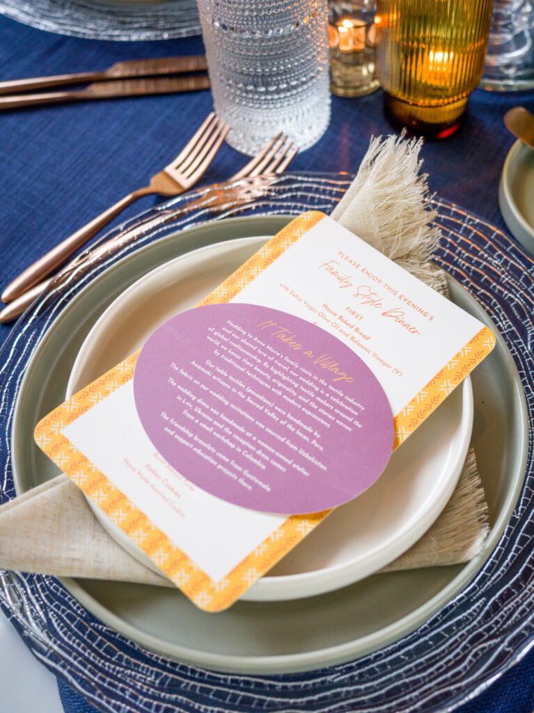 Wedding menu at each place setting with a note explaining global and fair-trade details of Anne Marie and Eric’s celebration.