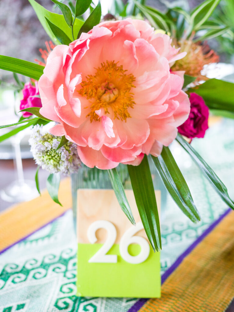 Color-block wooden table numbers with acrylic numbers created by Mittens and Lakes for Anne Marie and Eric’s wedding.”